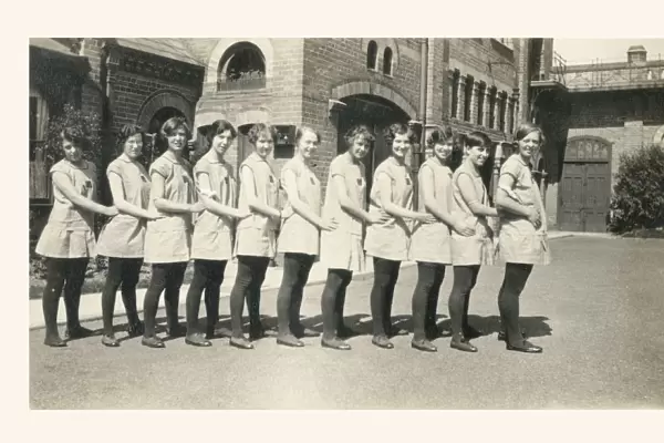 Eleven British Public Schoolgirls in their PE Gymslips