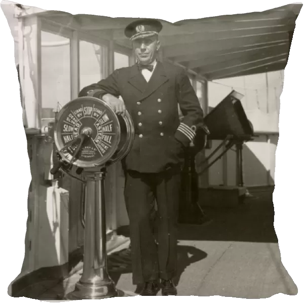 Royal Navy captain on bridge of warship