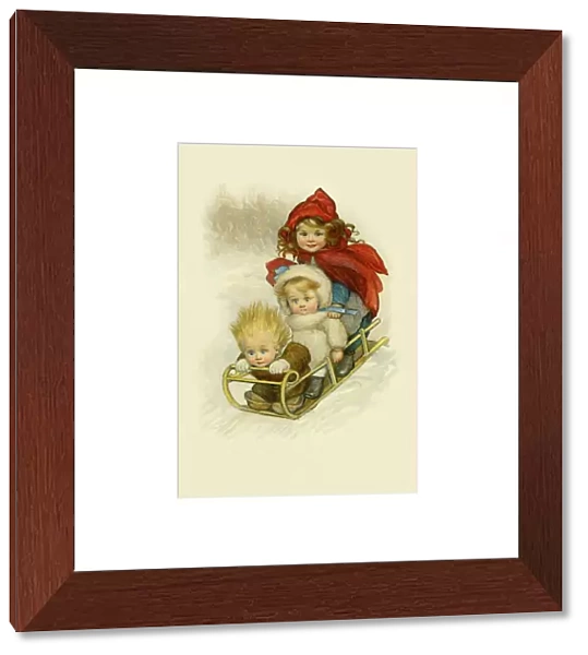 Three children on a sleigh