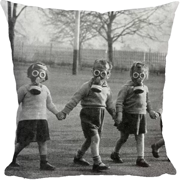 Evacuee children in gas masks near Windsor, 1941