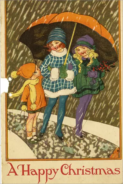 Christmas card, children under umbrella in snow