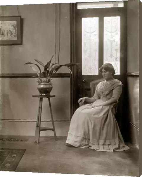 Young Edwardian woman and plant