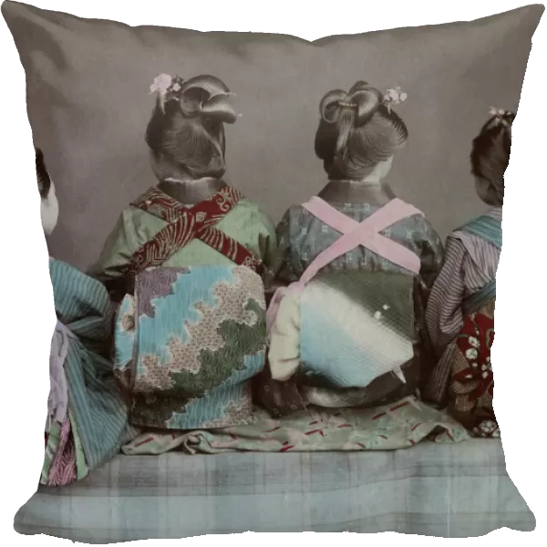 Back view of three geishas displaying obi sashes