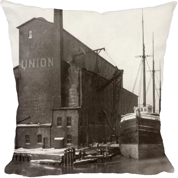 c. 1900s - grain store and ship in dock, Chicago port