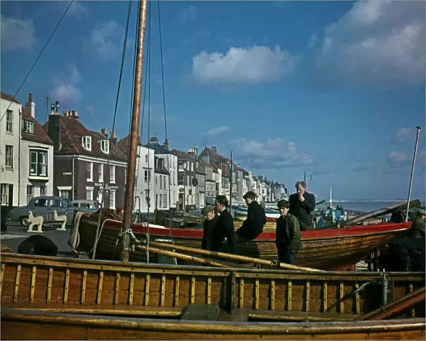 Fishermen with their boat at Deal, Kent