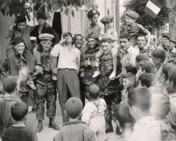 North Africa : as the Germans and Italians are driven out of Africa, Free French troops are welcomed back to the former French territories Date: 1943