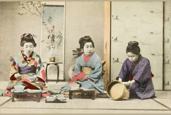 Three Geisha Girls eating a meal