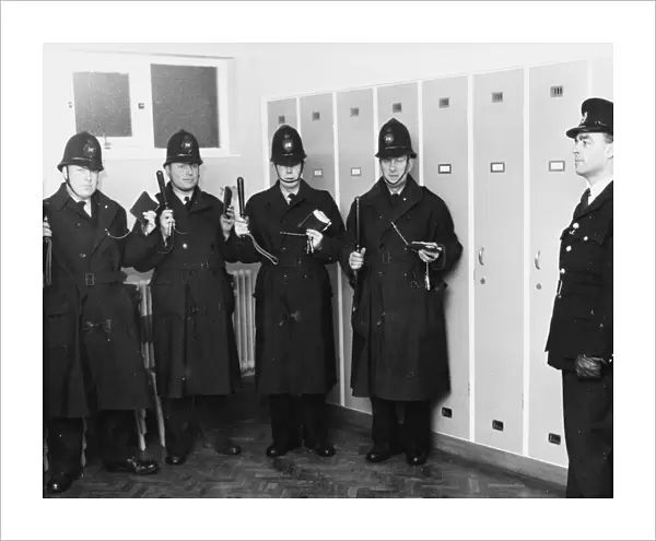 Policemen in station parade room, London