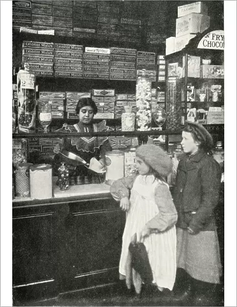 Olive Malvery serving in a sweet shop