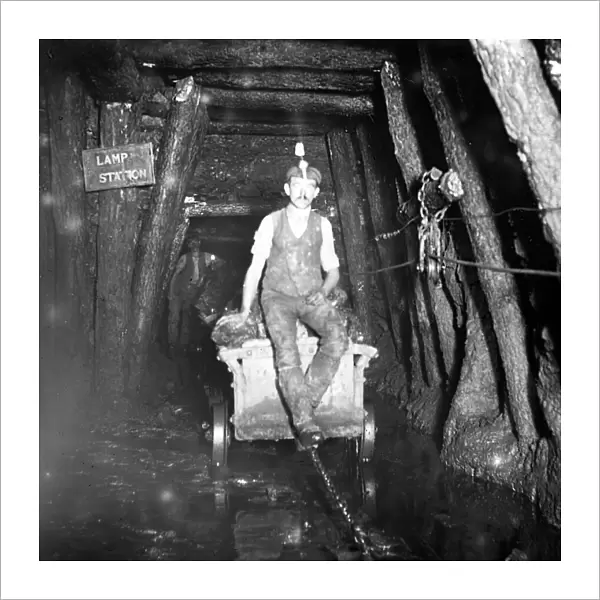 Miner riding drams, Tirpentwys Colliery, South Wales