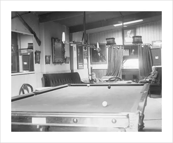 Snooker room with two players