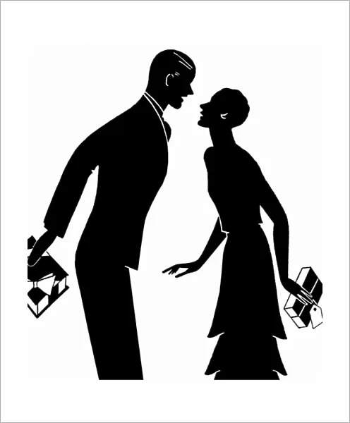 Silhouette of couple giving each other Christmas presents