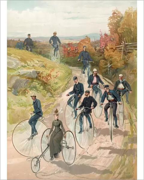 Bicycling. Woman, on three wheel bicycle, followed by men on high-wheelers. Date c1887