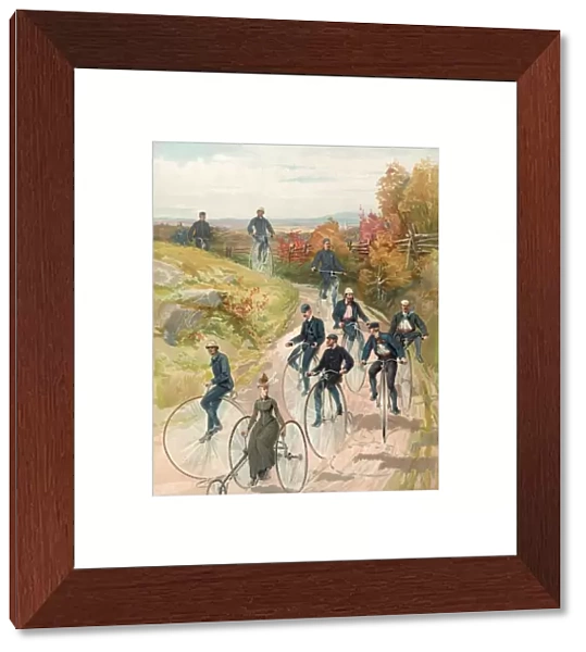 Bicycling. Woman, on three wheel bicycle, followed by men on high-wheelers. Date c1887