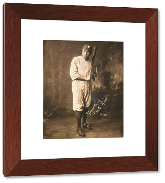 Babe Ruth, full-length portrait, standing, facing slightly l