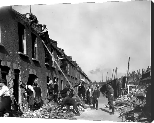 Blitz in London -- rescue workers in bombed street, WW2