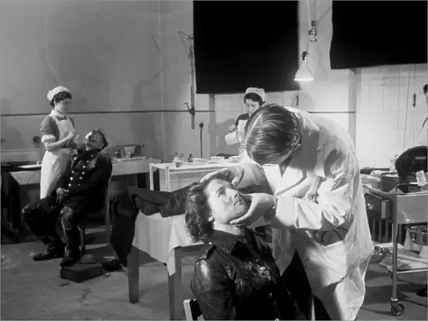 Blitz in London -- AFS personnel receiving treatment, WW2