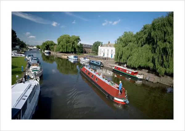 Canal boats on The River Ouse - Ely - Cambridgeshire - England - UK