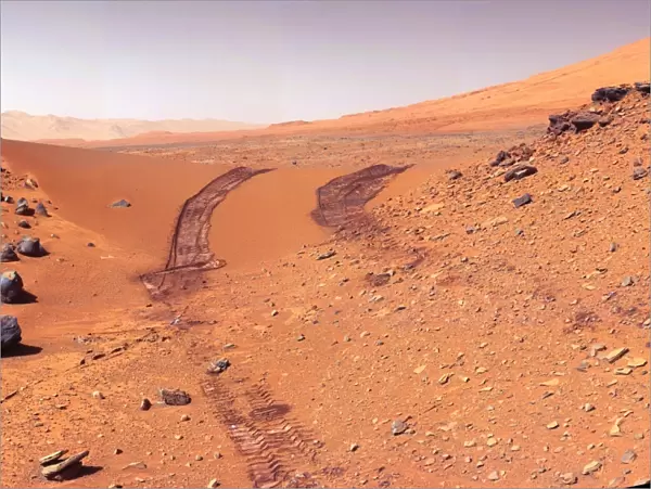 Tracks of the Curiosity rover on Mars. View looking back at a dune that NASA s