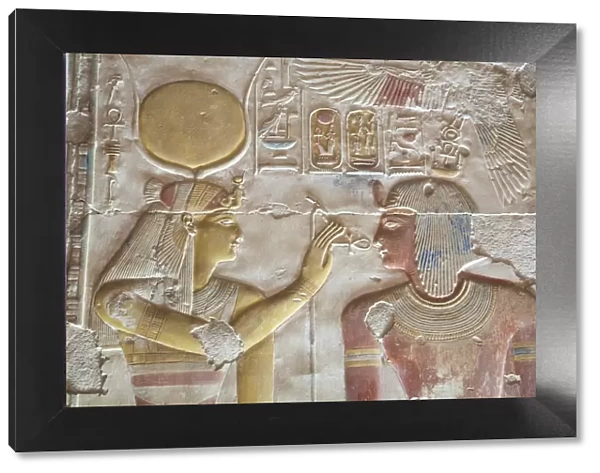 Bas-relief of Pharaoh Seti I on right with the Goddess Hathor on left, Temple of Seti I