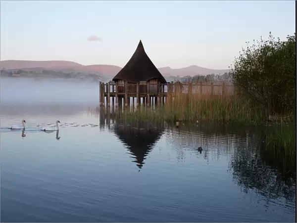 Llangorse Lake and Crannog Island in morning mist, Llangorse, Brecon Beacons National Park