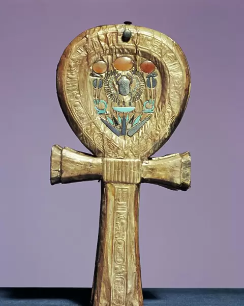 Mirror case in the form of an ankh, the sign of life, made of gilt wood inlaid with glass-paste