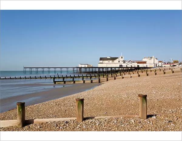 Deserted pebble beach at low tide and pier from east side, Bognor Regis