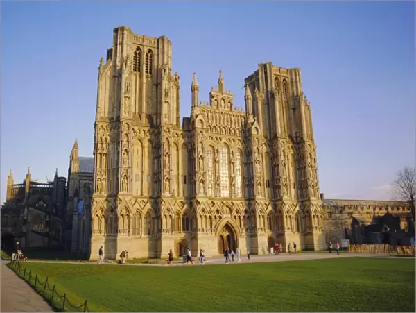 The West Front of the Cathedral, in late autumn sun, Wells, Somerset, England, UK