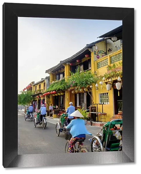 General view of shop houses and bicycles in Hoi An, Vietnam, Indochina, Southeast Asia