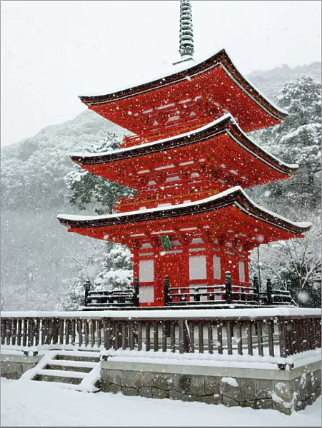 Snow falling on small red pagoda, Kiyomizu-dera Temple, UNESCO World Heritage Site