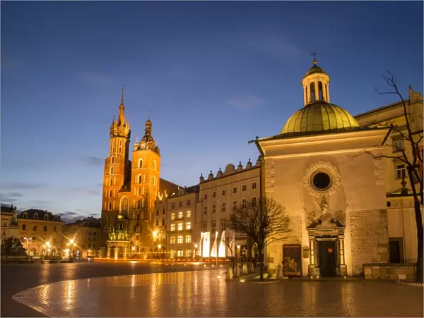 St. Marys Church (St. Marys Basilica) and main square illuminated at dawn, UNESCO