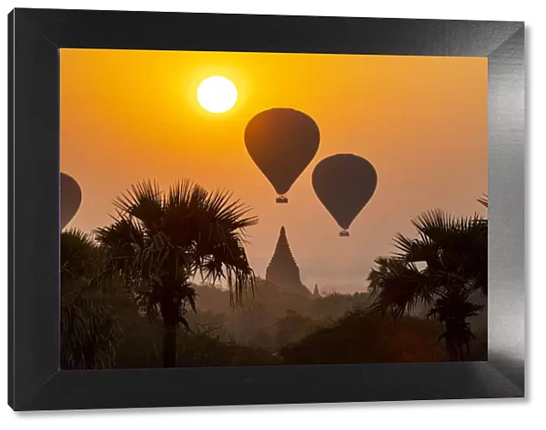 Hot air balloons over Bagan at sunrise, Bagan (Pagan), Myanmar (Burma), Asia