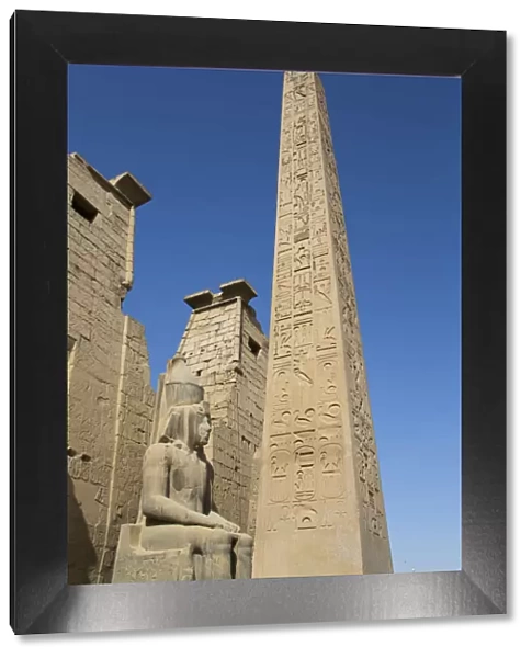 Colossus of Ramses II in front of Pylon, Obelisk, Luxor Temple