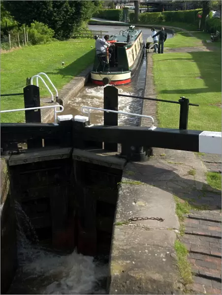Narrow boat on the Llangollen Canal going through the locks at Grindley Brook