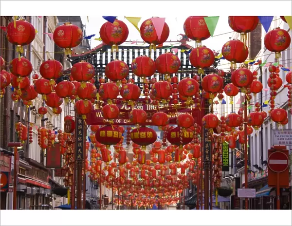 Gerrard Street, Chinatown, during the Chinese New Year celebrations, decorated with colourful Chinese lanterns, Soho, London, England, United