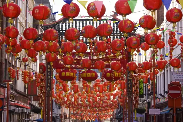 Gerrard Street, Chinatown, during the Chinese New Year celebrations, decorated with colourful Chinese lanterns, Soho, London, England, United