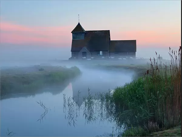 Fairfield church in dawn mist, Romney Marsh, near Rye, Kent, England, United Kingdom