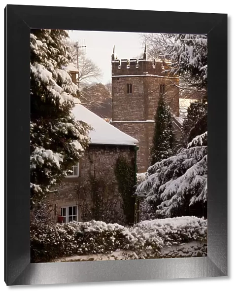 Cottage and church, Ashford in the Water, Derbyshire, England, United Kingdom, Europe