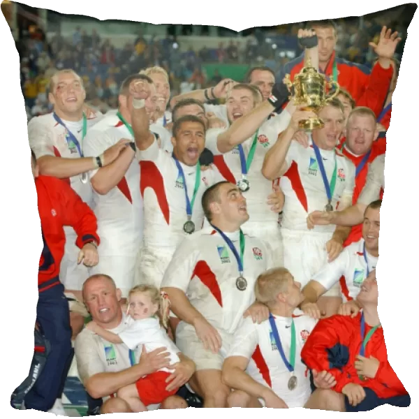 The England team celebrate after winning the rugby World Cup