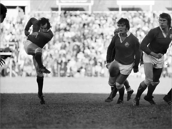 Gareth Edwards kicks ahead for the Lions in 1974