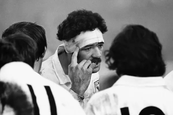 Mervyn Davies gives his Swansea side a team-talk in 1975