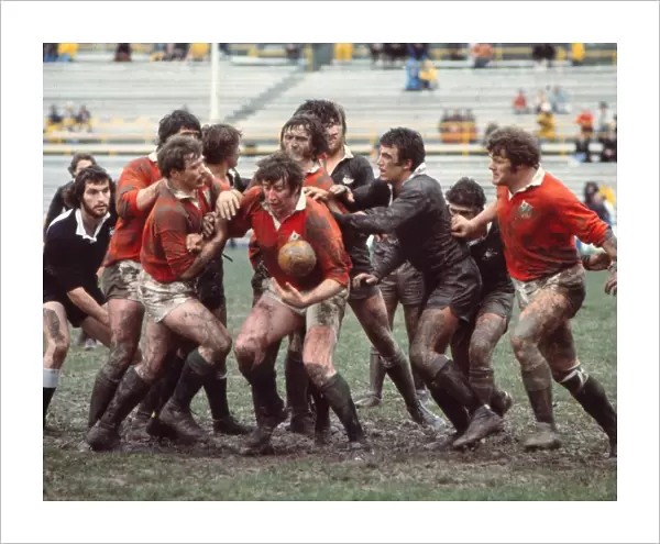 The British Lions and Junior All Blacks clash in the mud in 1977