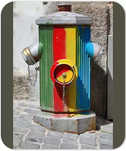 Multi-coloured fire hydrant in Porto, Portugal