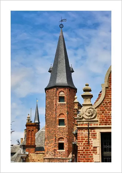 Medievel tower and roof decorations on the Huidevettershuis, Bruges, Belgium