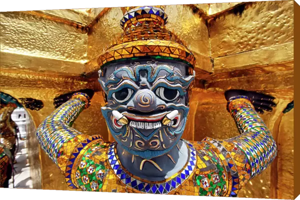 Spot colour Yaksha Demon Statue at Wat Phra Kaew temple, Bangkok, Thailand