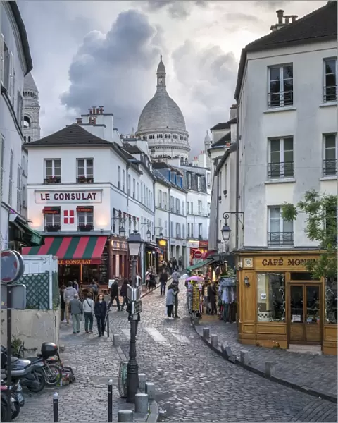 Streets of Montmartre with Sacre Coeur Basilica in the background, Paris, France