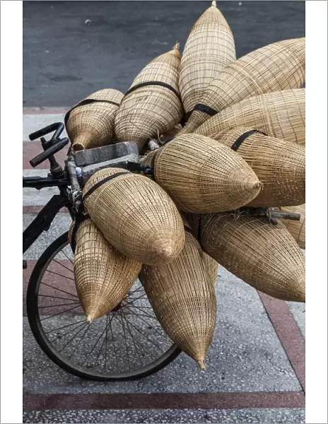 Vietnam, Ho Chi Minh City, bicycle with wicker baskets