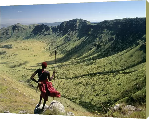 A Samburu warrior looks out across the eastern scarp