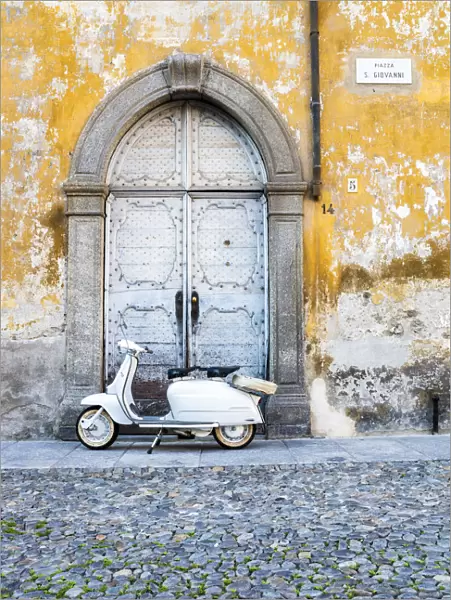 Iconic Lambretta Innocenti scooter in the old town, Morbegno, province of Sondrio