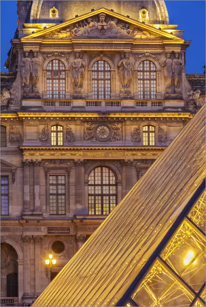 France, Paris, The Louvre, Pyramid at dusk
